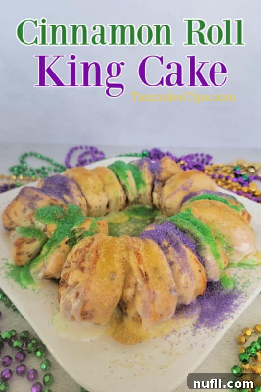 Delicious Easy Cinnamon Roll King Cake 2 Cinnamon Roll King Cake over a white platter with cinnamon rolls, purple, gold and green sprinkles surrounded by mardi gras beads