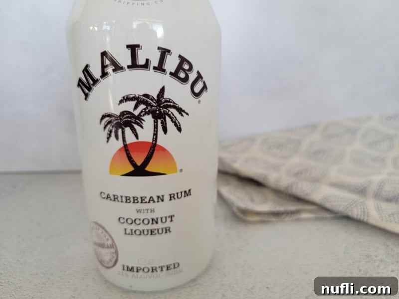 Malibu Rum Tropical Creations 21 Malibu rum bottle next to a cloth napkin