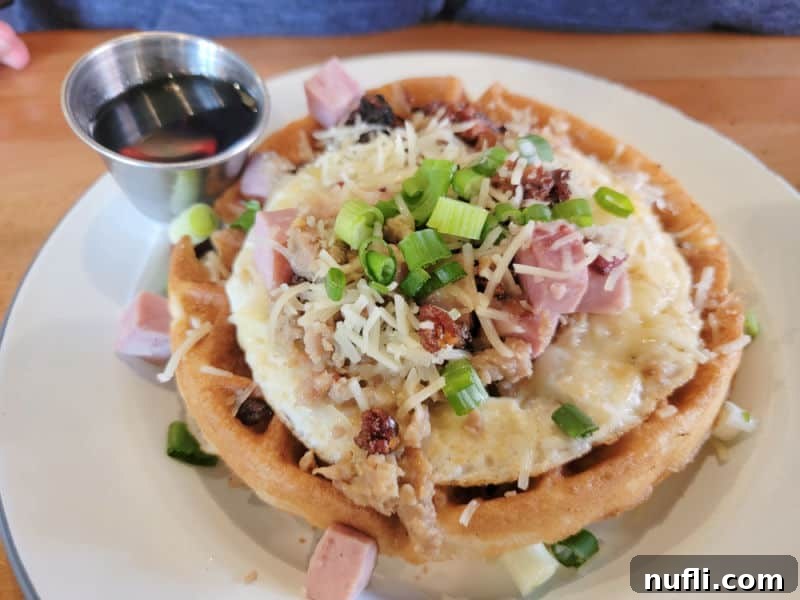 Ellensburg Unveiled: Your Washington Adventure 7 Waffles with eggs and ham on a white plate