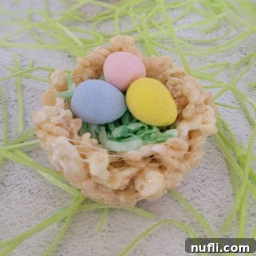 Easter Rice Krispie Nests Surrounded by edible grass