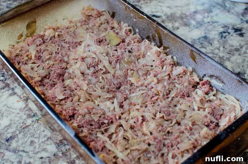 Hearty Corned Beef Shepherds Pie 6 corned beef and sauerkraut in a casserole dish