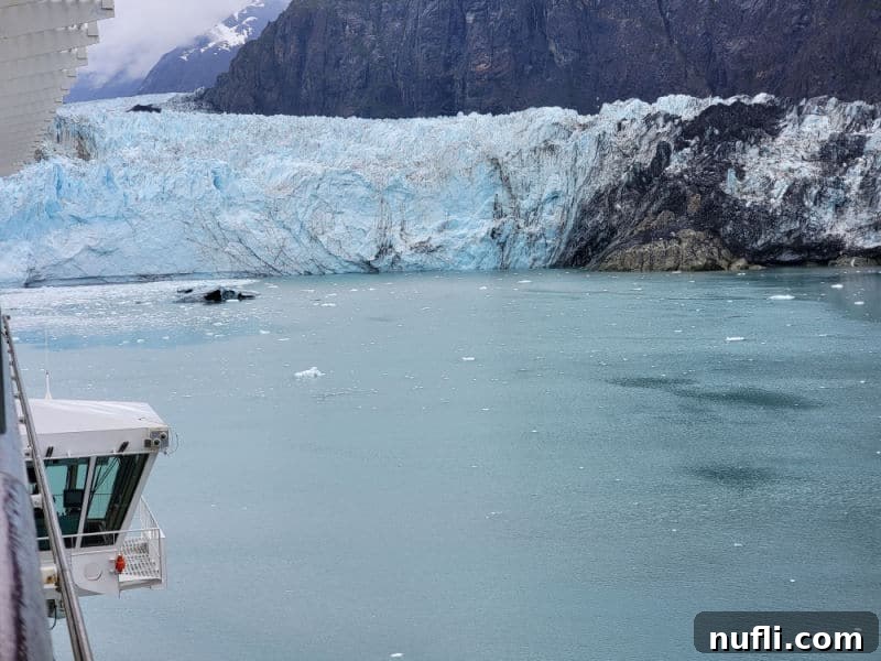 Looking down the cruise ship to a large glacier