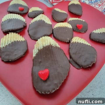 chocolate covered potato chips on a red plate