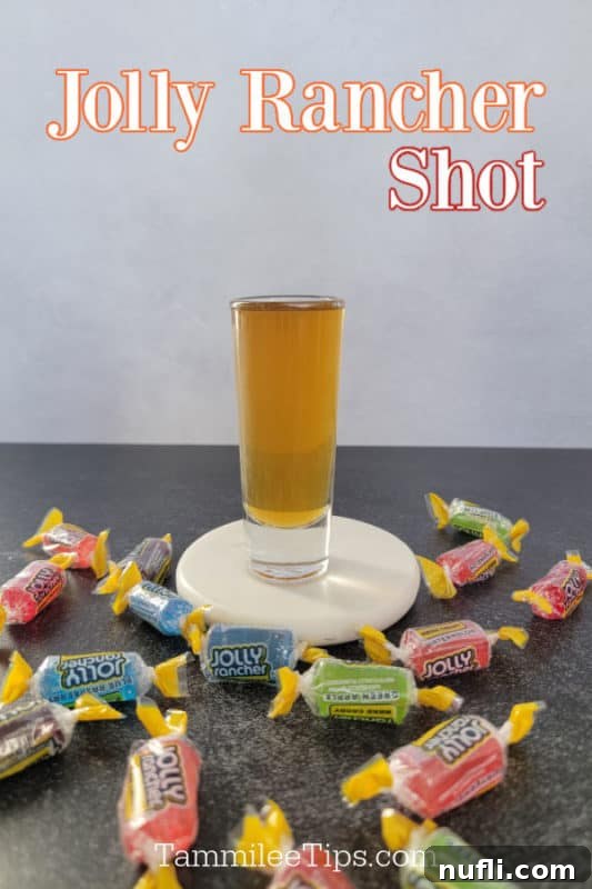 Jolly Rancher Shot text over a filled shot glass with multi-colored jolly rancher candies