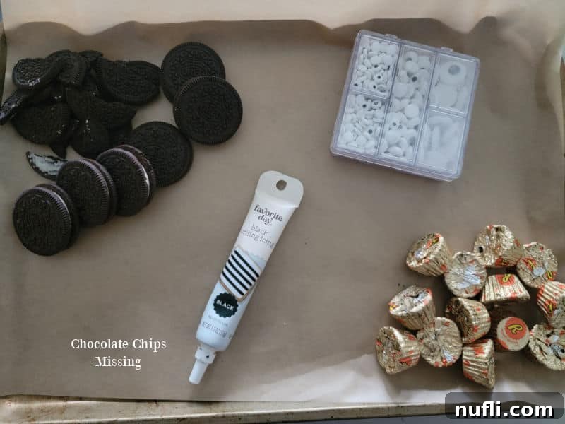 Ingredients for Reese's Bats: Oreo cookies, candy eyes, chocolate chips, and mini Reese's Peanut Butter Cups.