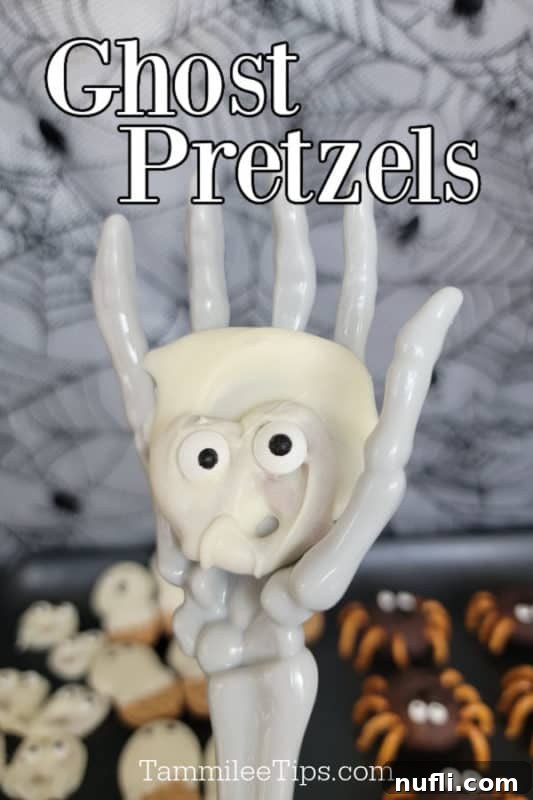 ghost pretzel held in a skeleton hand with ghost pretzels text above