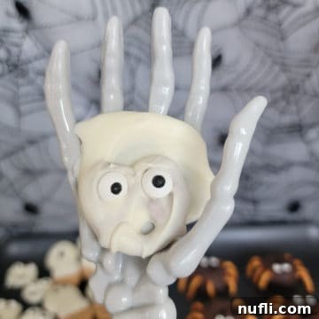 Pretzel Ghosts held by skeleton hand