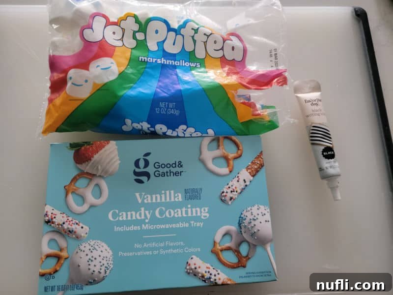 Marshmallow Ghosts ingredients marshmallows, vanilla candy coating, and icing pen