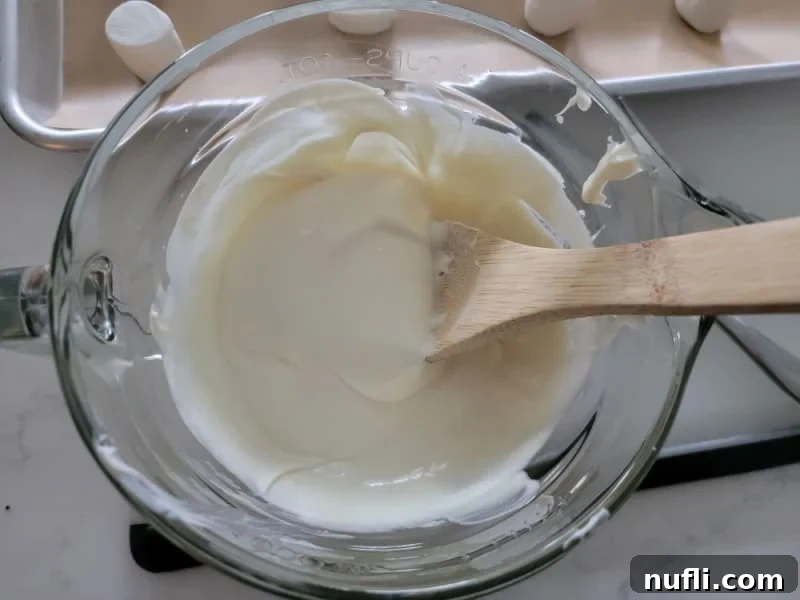 melted candy melts in a glass bowl for marshmallow ghosts