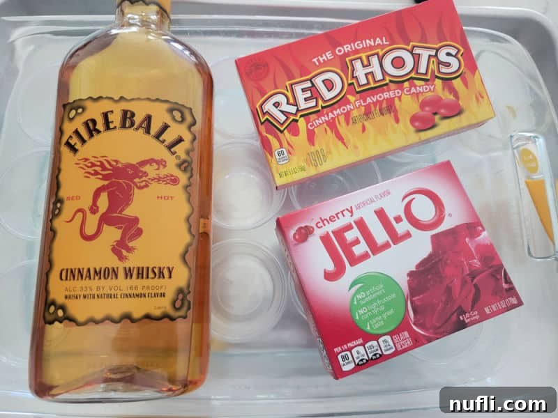 fireball cinnamon whisky, red hot candy and cherry jello for fireball jello shots