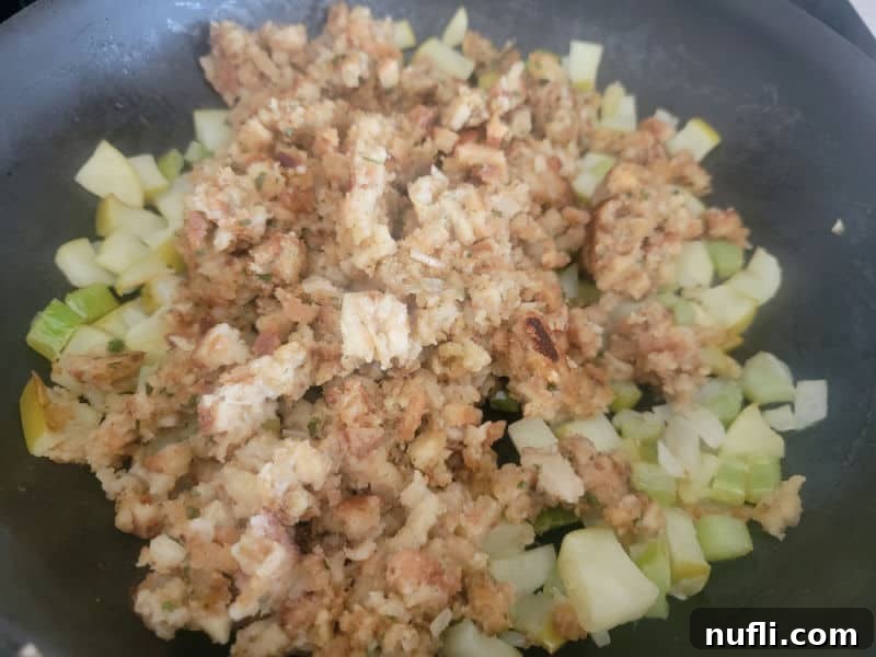 Deliciously Easy Apple Stuffing 4 Apple stuffing in a skillet before mixing together.