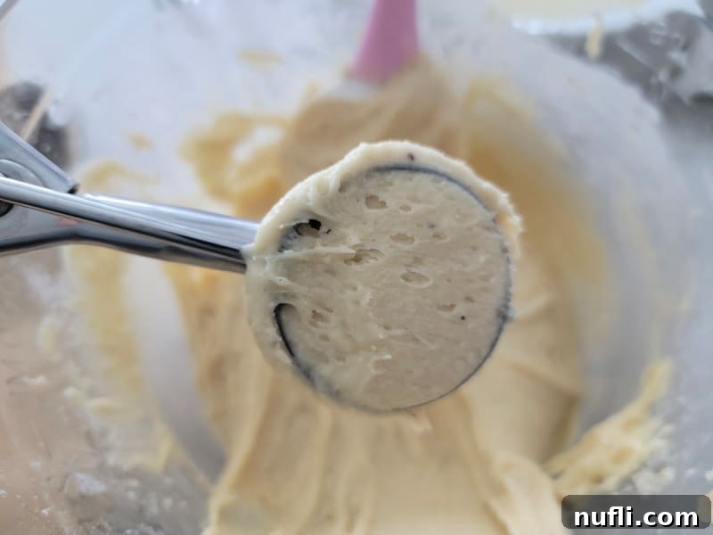 Eggnog cookie dough in a cookie scoop