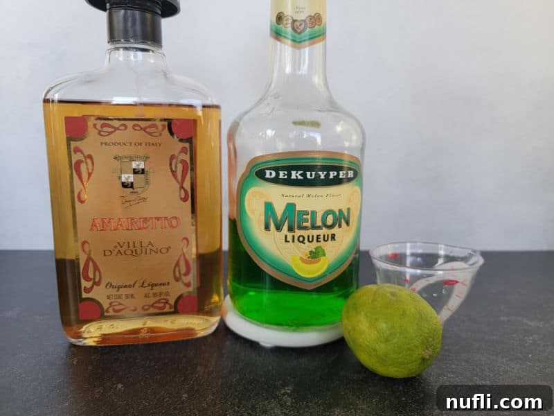 Broken Down Golf Cart Shot ingredients, amaretto, melon liqueur, and lime