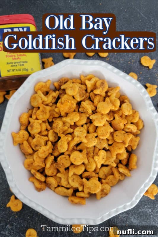 Old Bay Goldfish Crackers text printed over a large white bowl filled with Goldfish Crackers and a container of Old Bay Seasoning