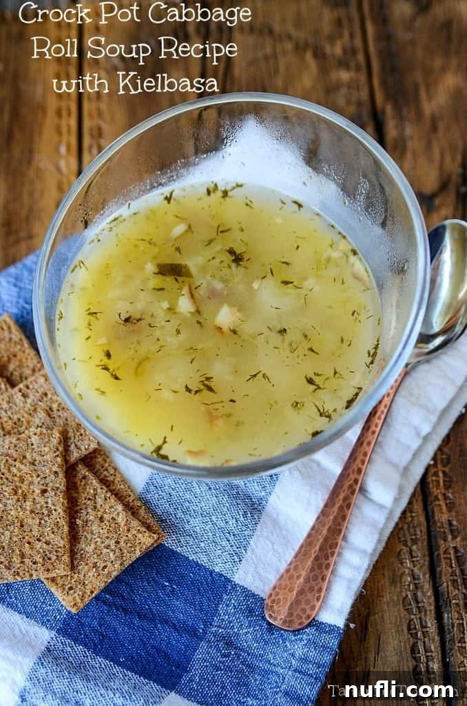 Crock Pot Cabbage Roll Soup Recipe with Kielbasa! This slow cooker soup recipe is so easy to make! Simple, healthy, you can easily add in potatoes and sausage. The perfect comfort foods with bacon and rice! Great for dinners, easy meals, and leftovers!