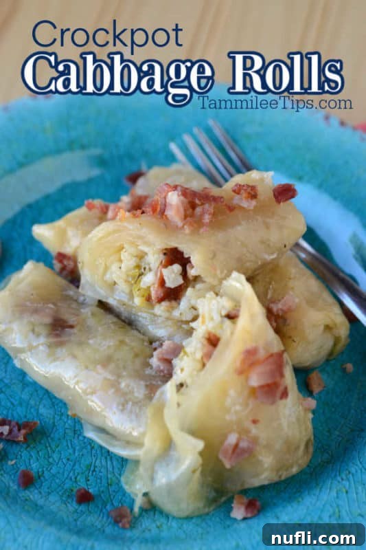 Crockpot Cabbage Rolls text over a blue plate with multiple cabbage rolls