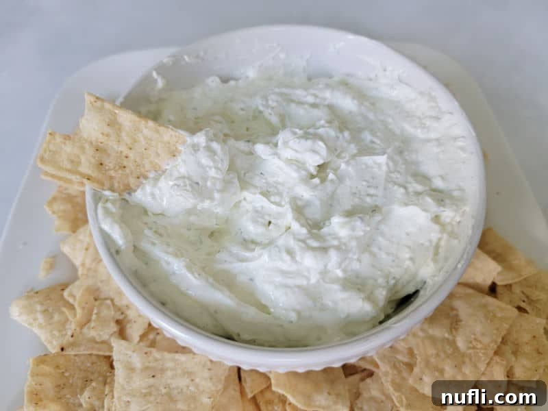Hidden Valley Ranch Dip in a white bowl with tortilla chips