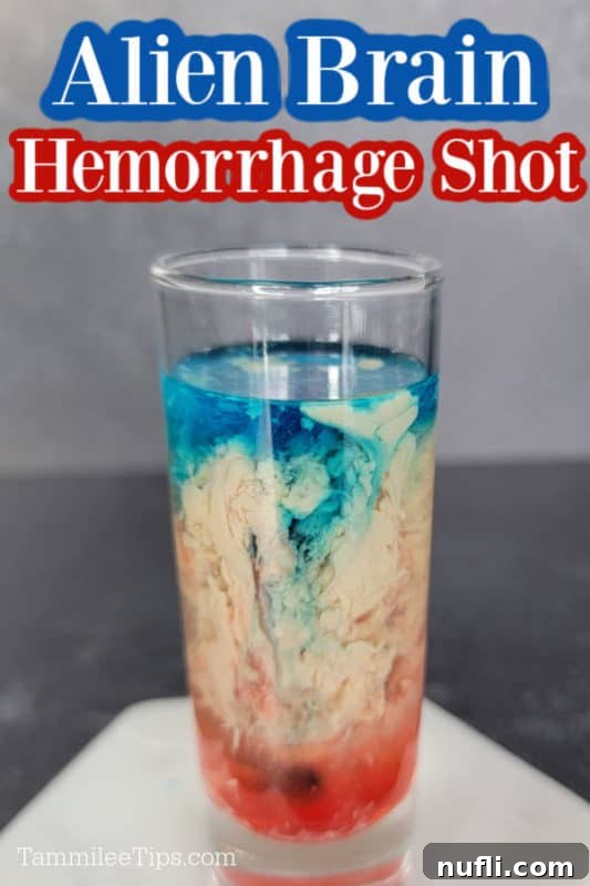 Alien Brain Hemorrhage Shot text over a red, cream, and blue cocktail shot on a coaster