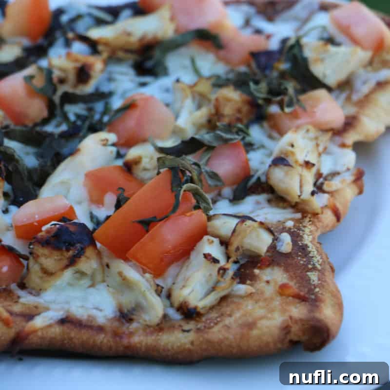 Score Big with These Game Day Appetizers 32 Chicken Bruschetta Pizza on a white plate