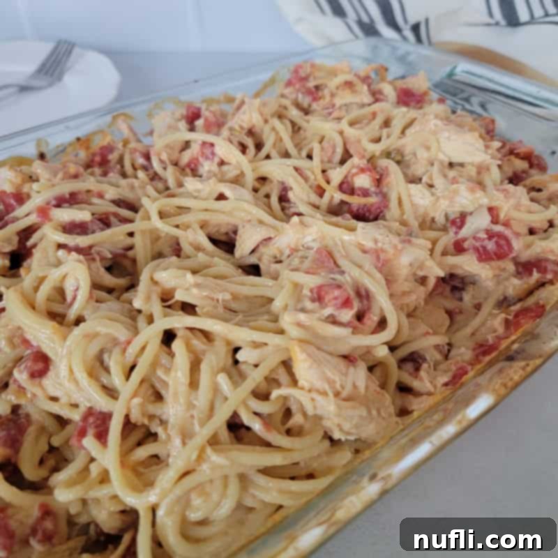 Chicken spaghetti in a glass casserole dish