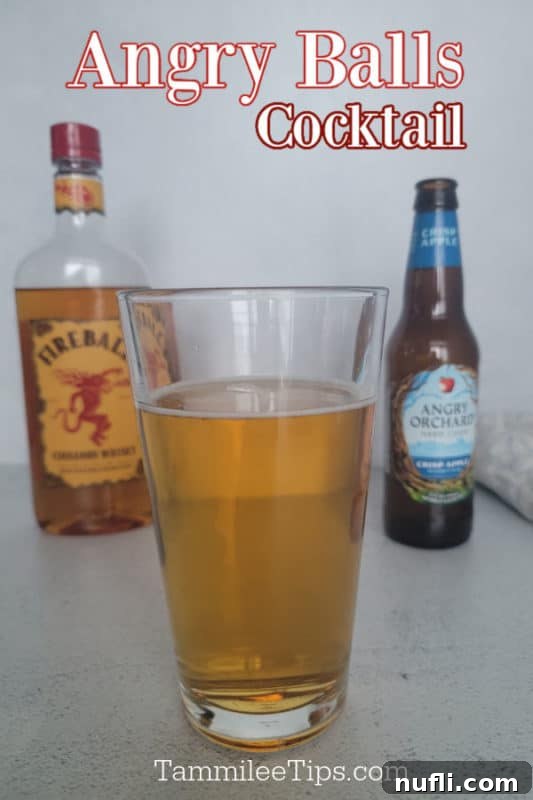 Angry Balls Cocktail text over a cocktail glass, fireball cinnamon whiskey, and hard apple cider