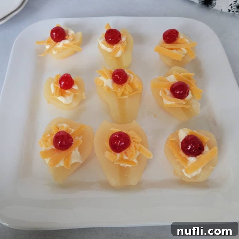 pear salad with cheddar cheese, maraschino cherries and mayo