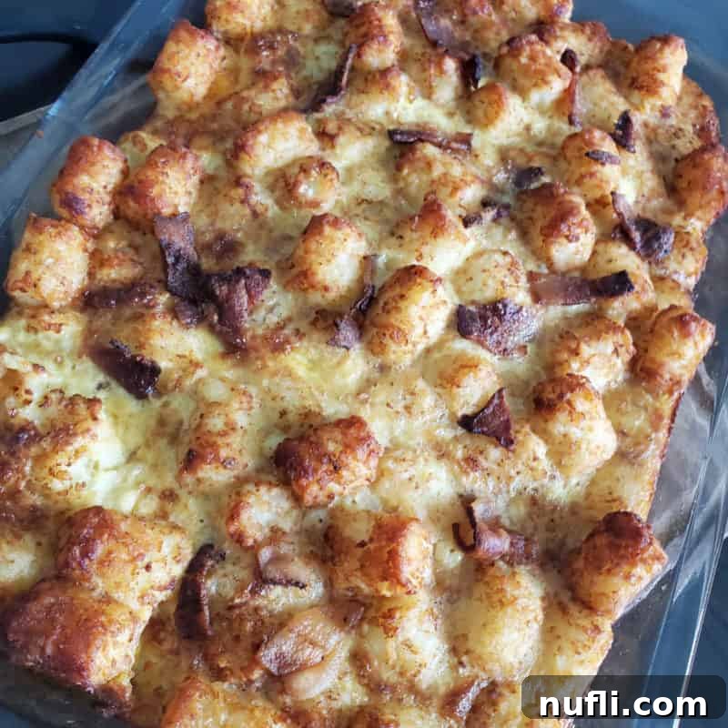 tater tot breakfast casserole in a glass baking dish