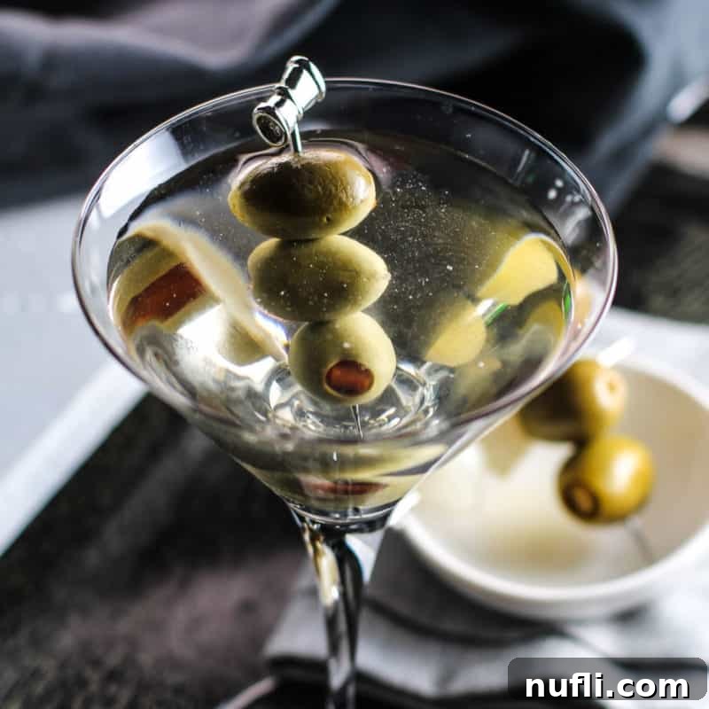 Classic Martini with olive garnish in a martini glass