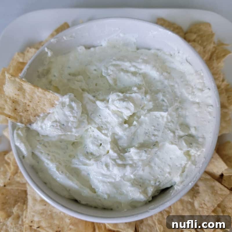 Three Ingredient Feasts Simple Scrumptious 17 Hidden Valley Ranch Dip in a white bowl with tortilla chips