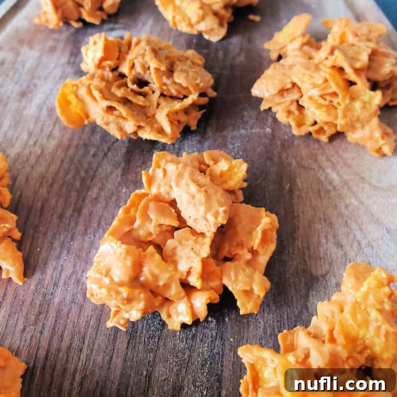 Three Ingredient Feasts Simple Scrumptious 32 No Bake Butterscotch Cornflake Cookies on wood platter