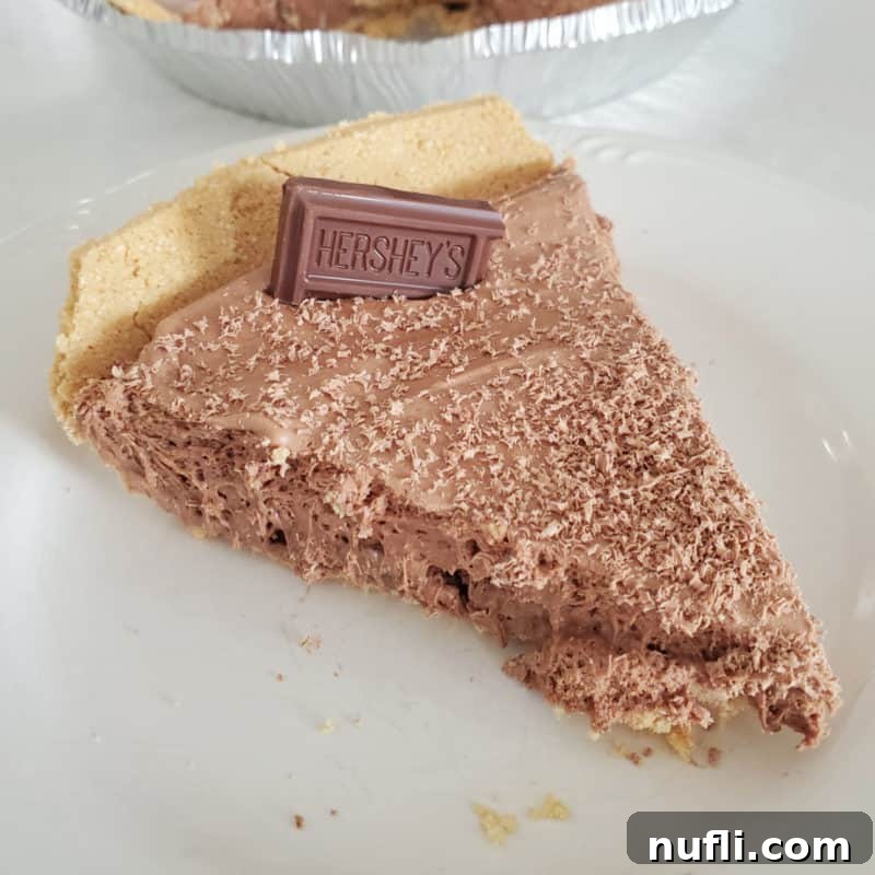 Three Ingredient Feasts Simple Scrumptious 40 Slice of Hershey no bake pie on a white plate