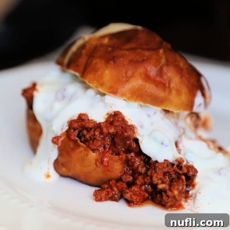 Buffalo sloppy joes on a pretzel bun