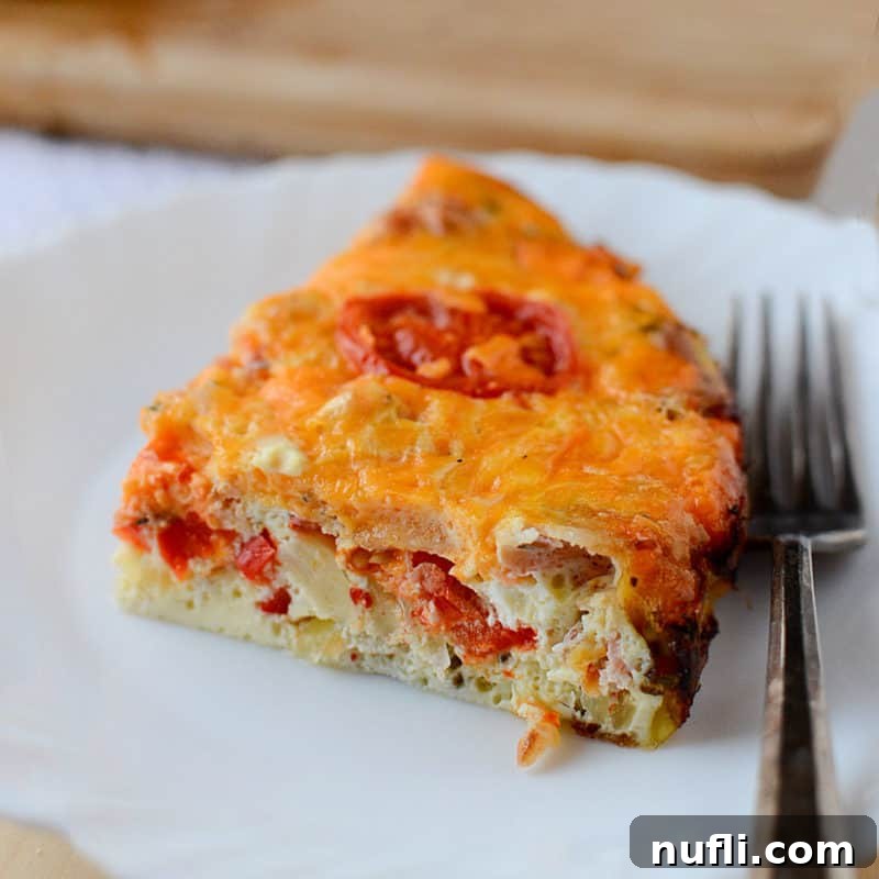 tomato and egg casserole on a white plate
