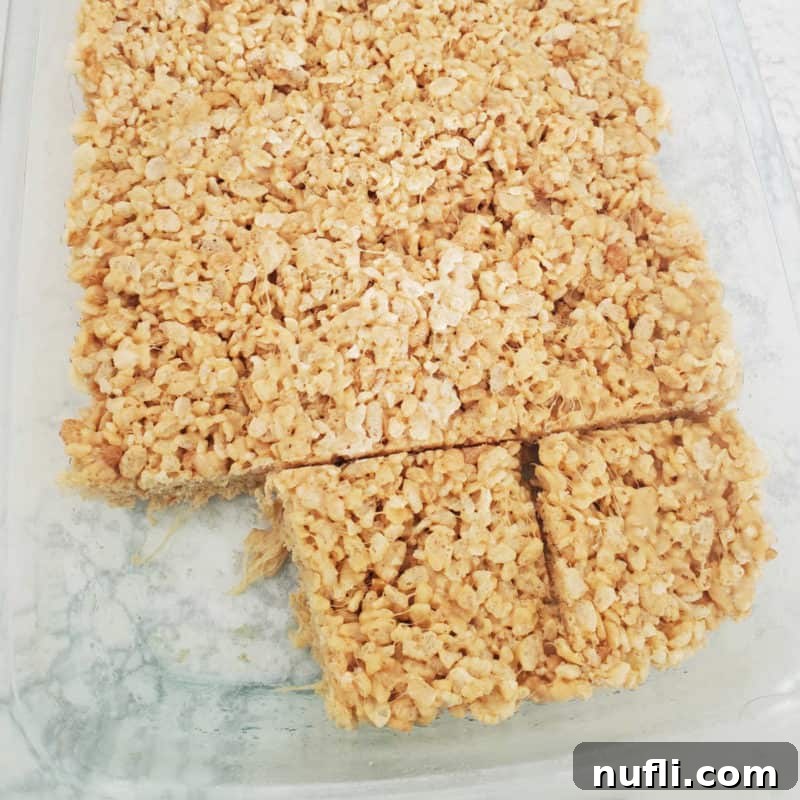 Irresistible Peanut Butter Creations 15 Peanut butter rice Krispie squares in a glass baking dish