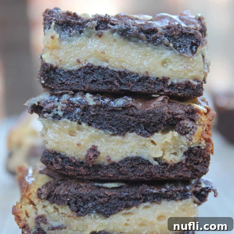 Irresistible Peanut Butter Creations 20 Stack of peanut butter chocolate buckeye bars on a wood plate