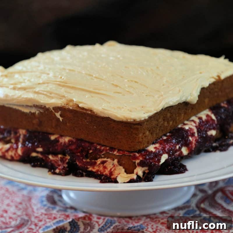 Irresistible Peanut Butter Creations 7 Peanut Butter and Jelly Cake on a white cake platter