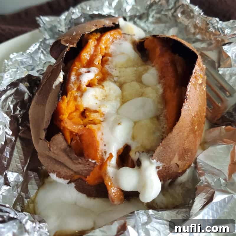 Copy Cat Texas Roadhouse Loaded Sweet Potato wrapped in aluminum foil
