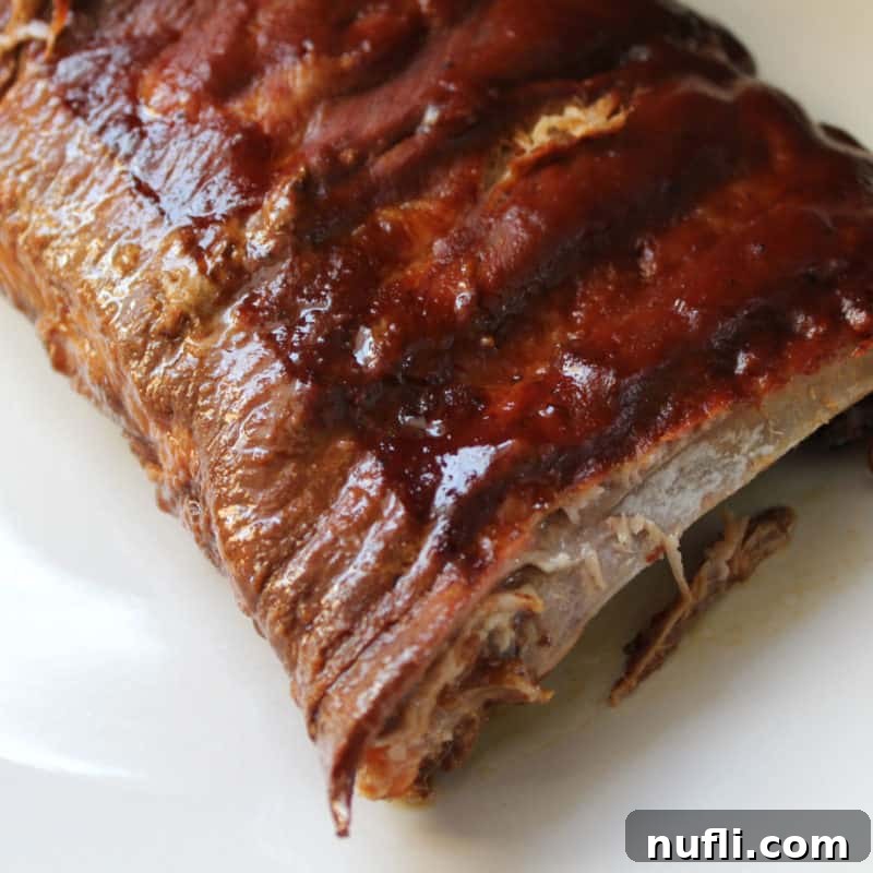 slow cooker ribs on a white plate