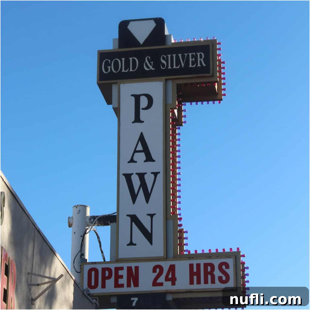 Gold & Silver Pawn Open 24 Hours sign