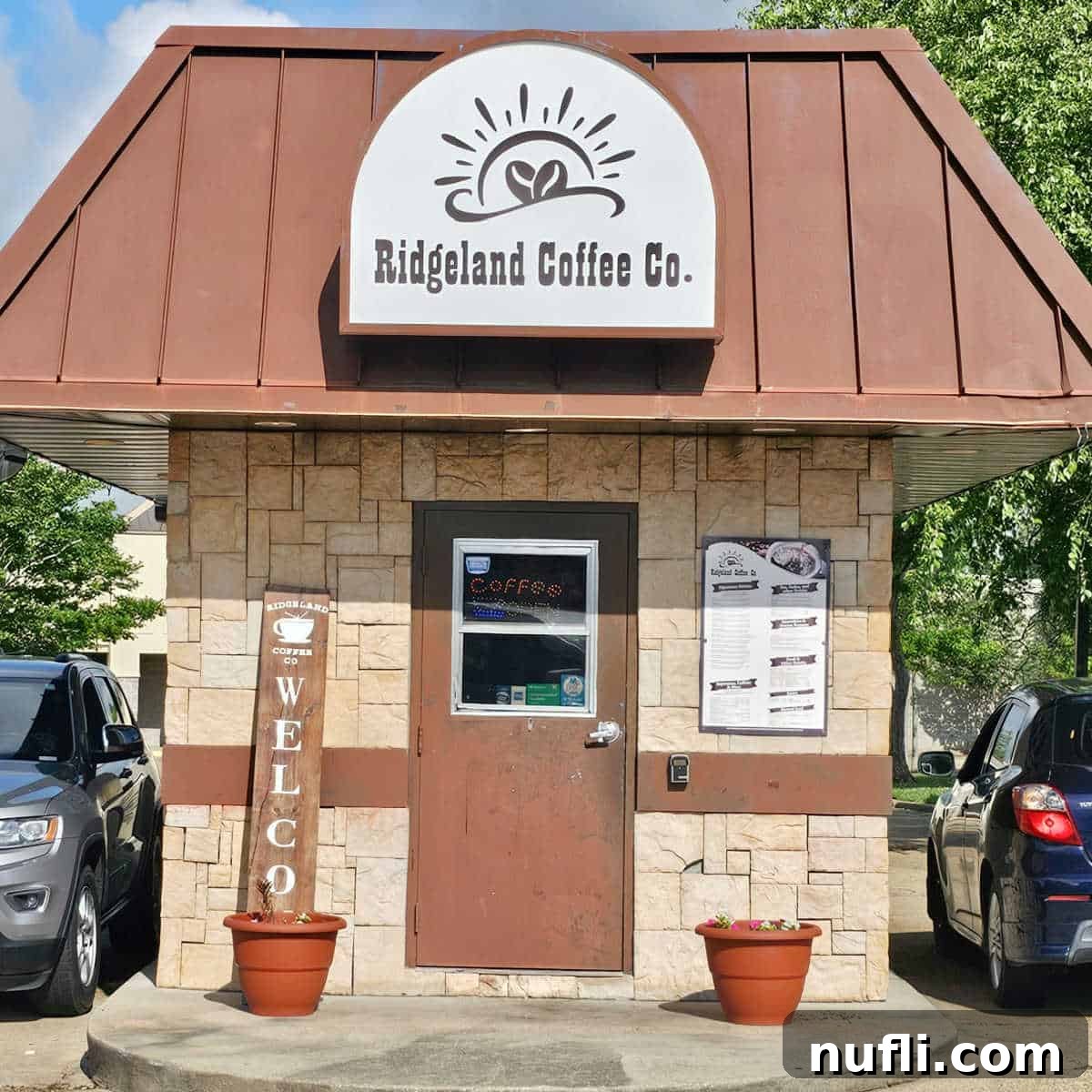 Ridgeland Coffee Co sign over a charming drive-thru coffee shop.