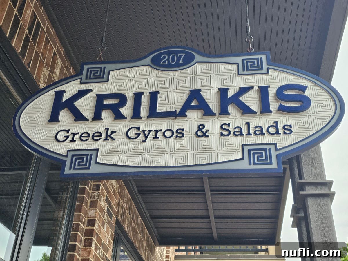 Krilakis Greek Gyros and Salads Sign, a local favorite for authentic Greek food.