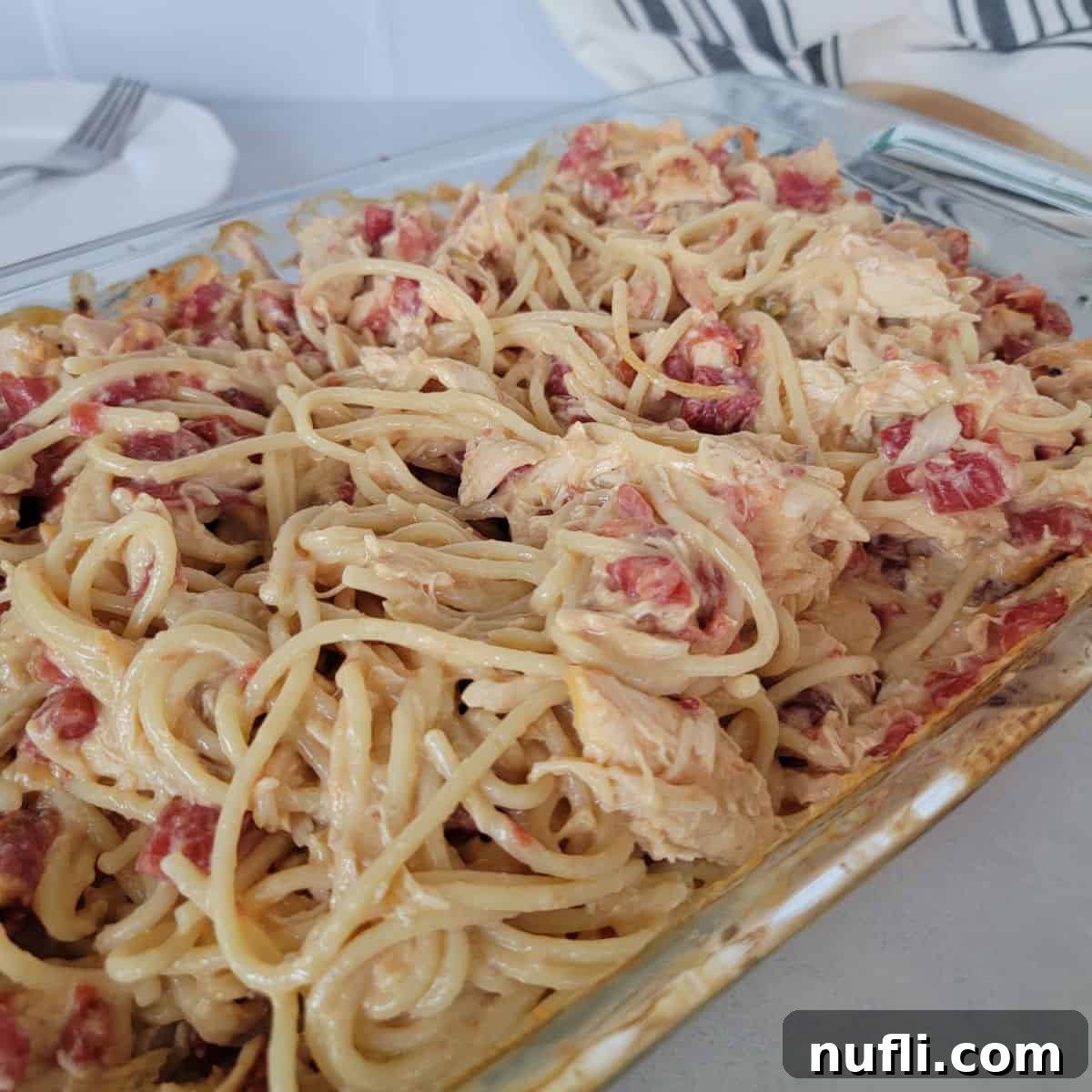 Chicken spaghetti in a glass casserole dish