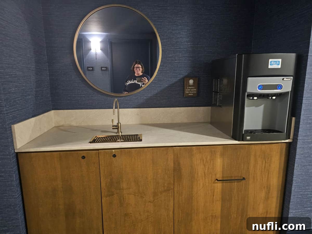 water bottle refill counter with sink and ice machine