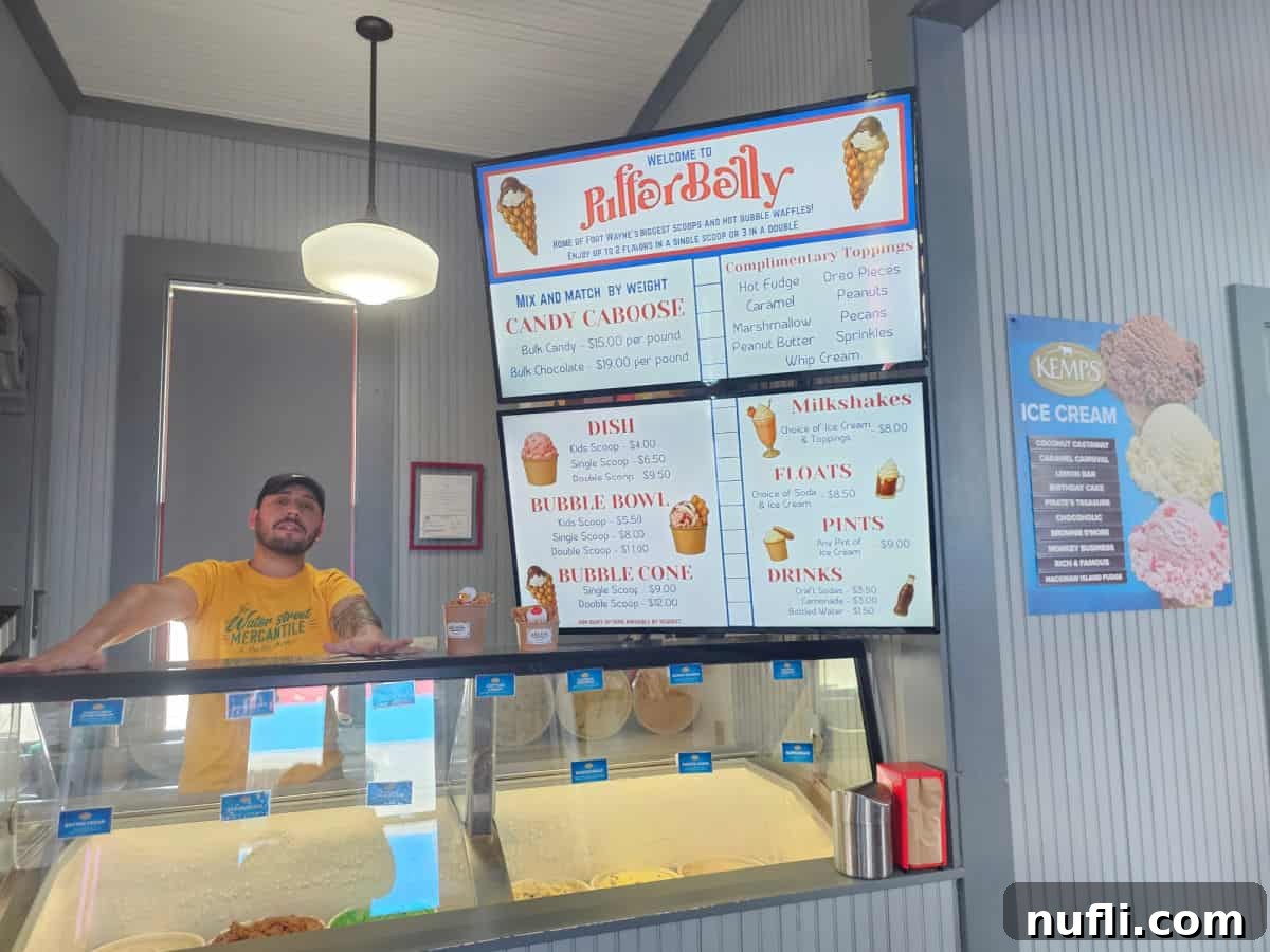 puffer belly menu with employee standing next to the ice cream stand