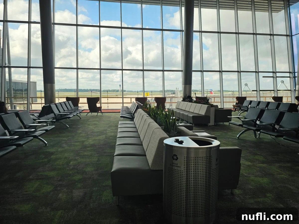 Fort Wayne Airport terminal with comfortable seating and large windows.