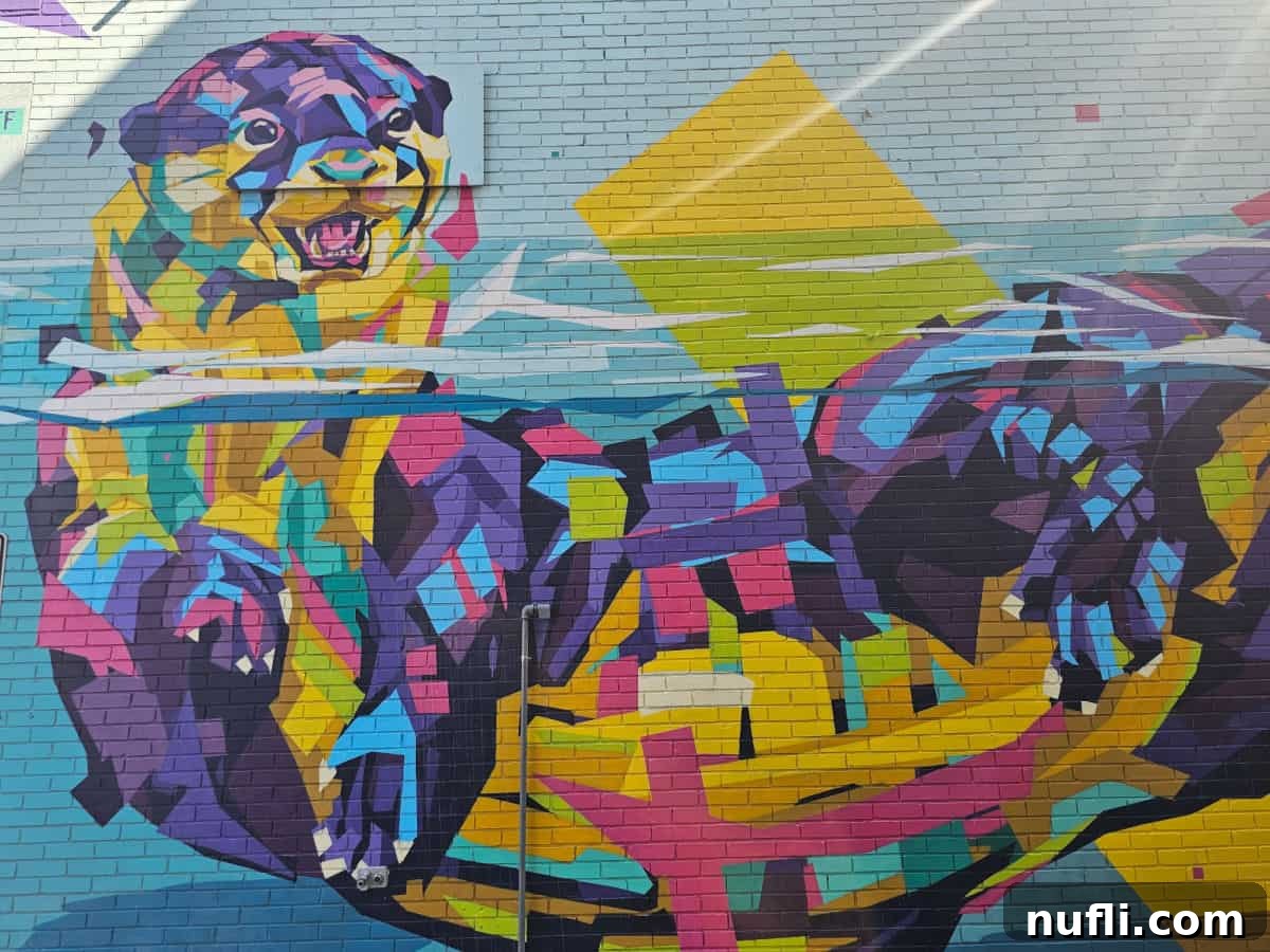 Abstract otter mural on a brick wall