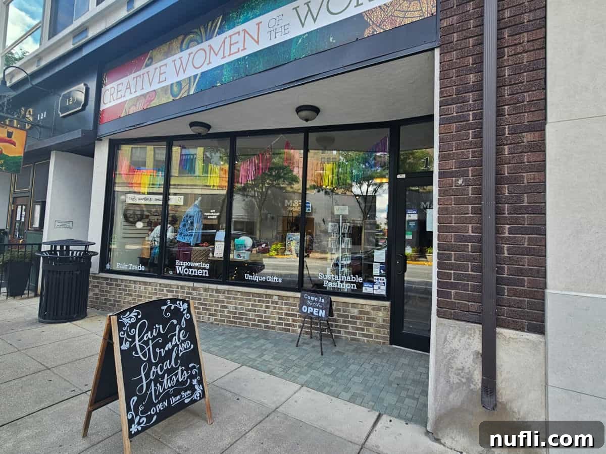 Creative women of the world sign over the entrance to the gift shop