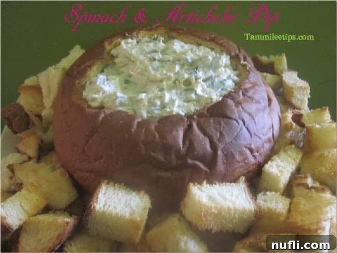 Baked Spinach Artichoke Dip in a Hawaiian bread bowl
