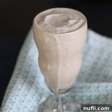 Homemade Wendy's Frosty in a glass on a cloth napkin