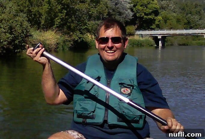 Little Spokane River Float Your Riverside State Park Escape 4 John in a lifejacket paddling a canoe